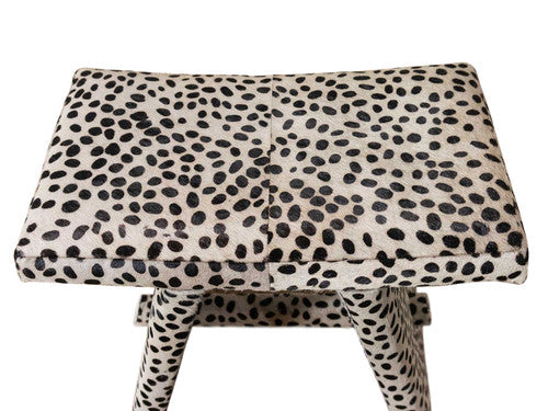 Ansel Spotted Hair-on-Hide Saddle Stool – angled view