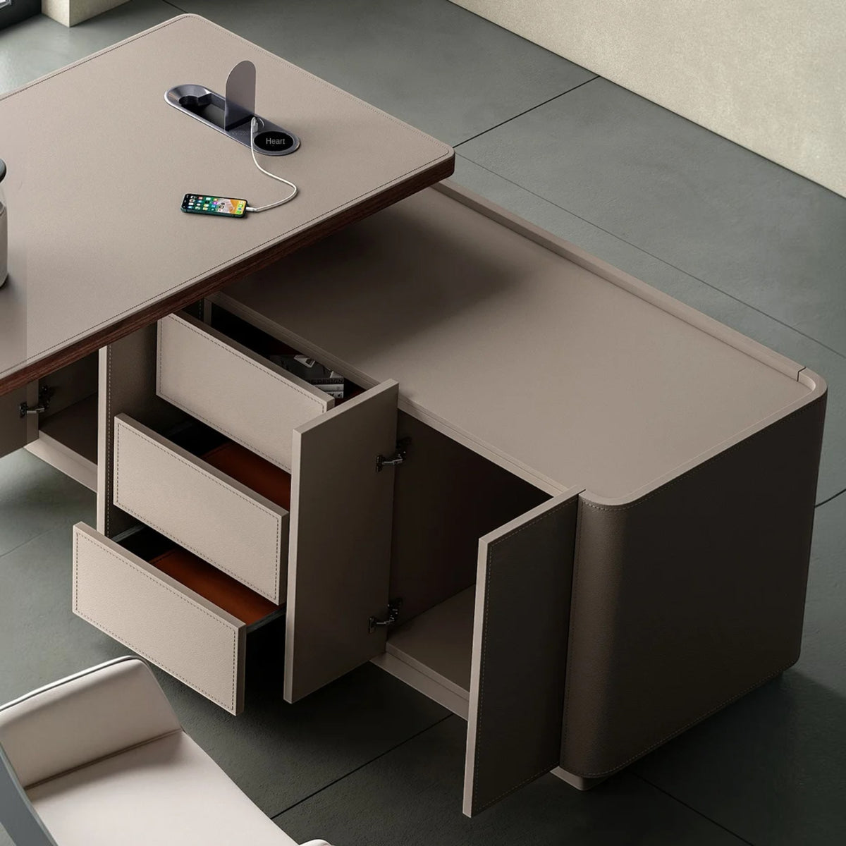 Urban Ashram Arden executive desk in taupe saddle leather with open drawers and storage cabinet, top view