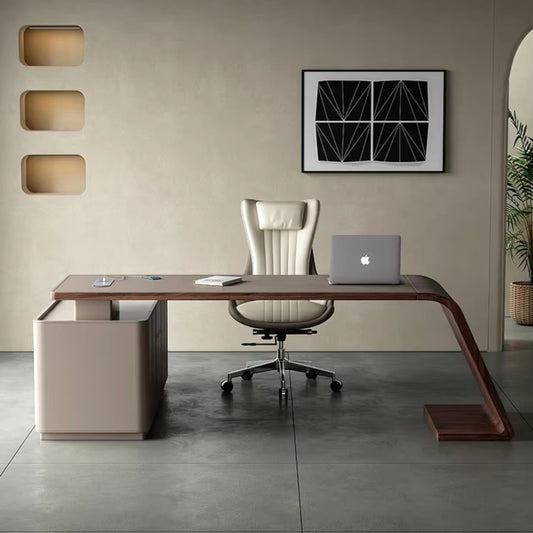 Urban Ashram Arden executive desk in saddle leather with a curved wooden frame and integrated storage in a home office