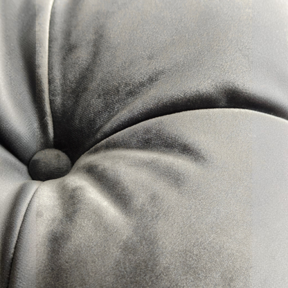Close-up of Urban Ashram Coco Miralda Chesterfield sofa in smoke grey velvet with hand-sewn button tufting detail.