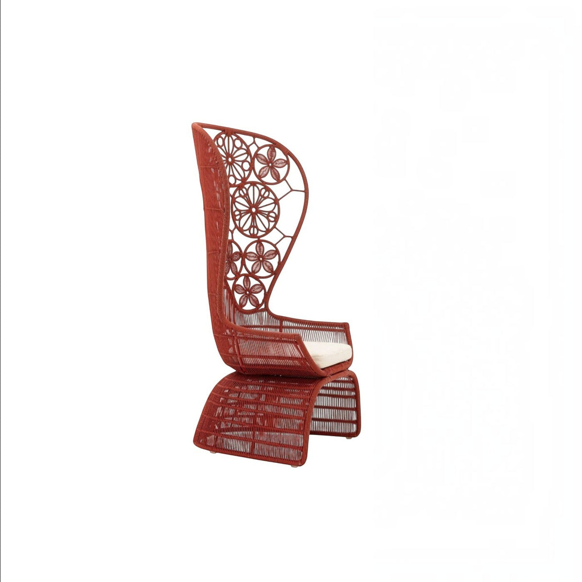 Urban Ashram Genevieve high-back armchair in terracotta red with a woven floral backrest and cream seat cushion.