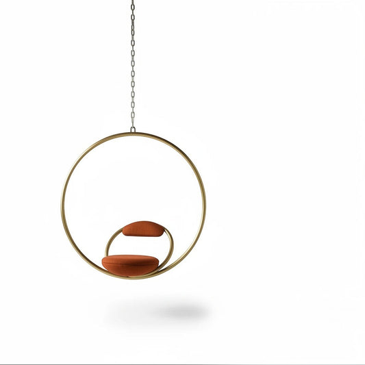 Urban Ashram Hanging Hoop Chair by Lee Broom featuring a brushed brass circular frame and red Kvadrat wool upholstery.