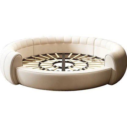 Urban Ashram round Dream Lounger movie bed in cream fabric with a tufted frame and exposed wooden slat base.