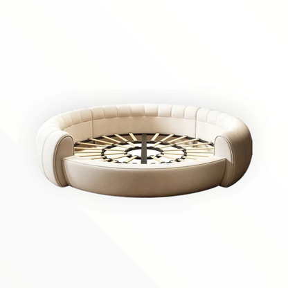 Urban Ashram round Dream Lounger movie bed in cream fabric with a tufted frame and exposed wooden slat base.