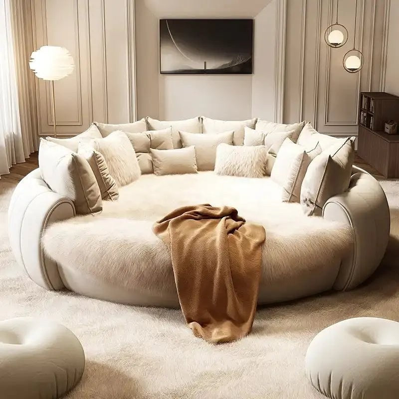 Urban Ashram Dream Lounger round movie bed in cream with plush faux fur texture and decorative throw pillows