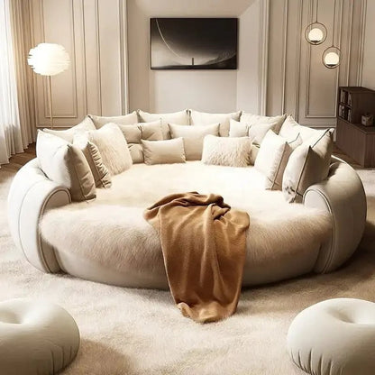 Urban Ashram Dream Lounger round movie bed in cream with plush faux fur texture and decorative throw pillows
