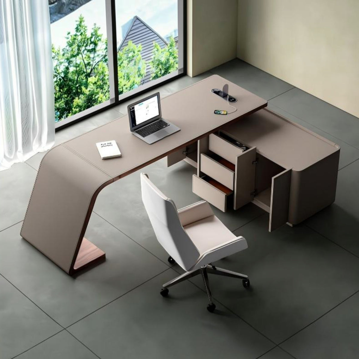 Urban Ashram Arden saddle leather executive desk with curved silhouette, integrated storage, and charging station.