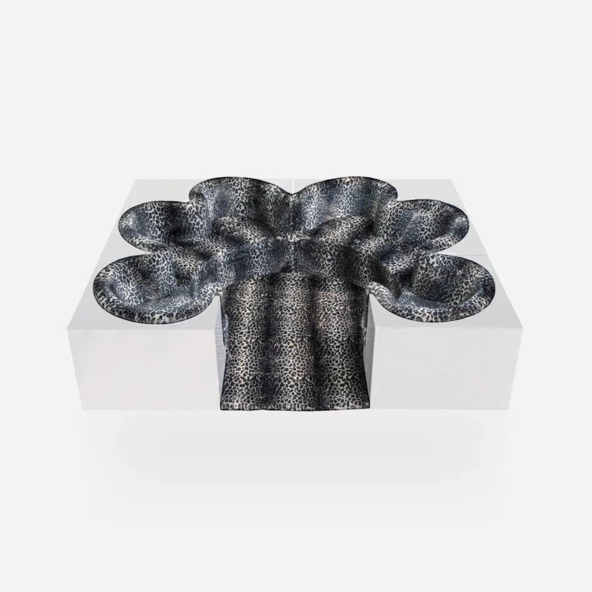 Urban Ashram Savanna modular sectional sofa featuring a sculptural, Italian-inspired design with leopard print fabric.