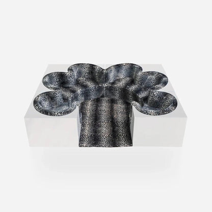 Urban Ashram Savanna modular sectional sofa featuring a sculptural, Italian-inspired design with leopard print fabric.