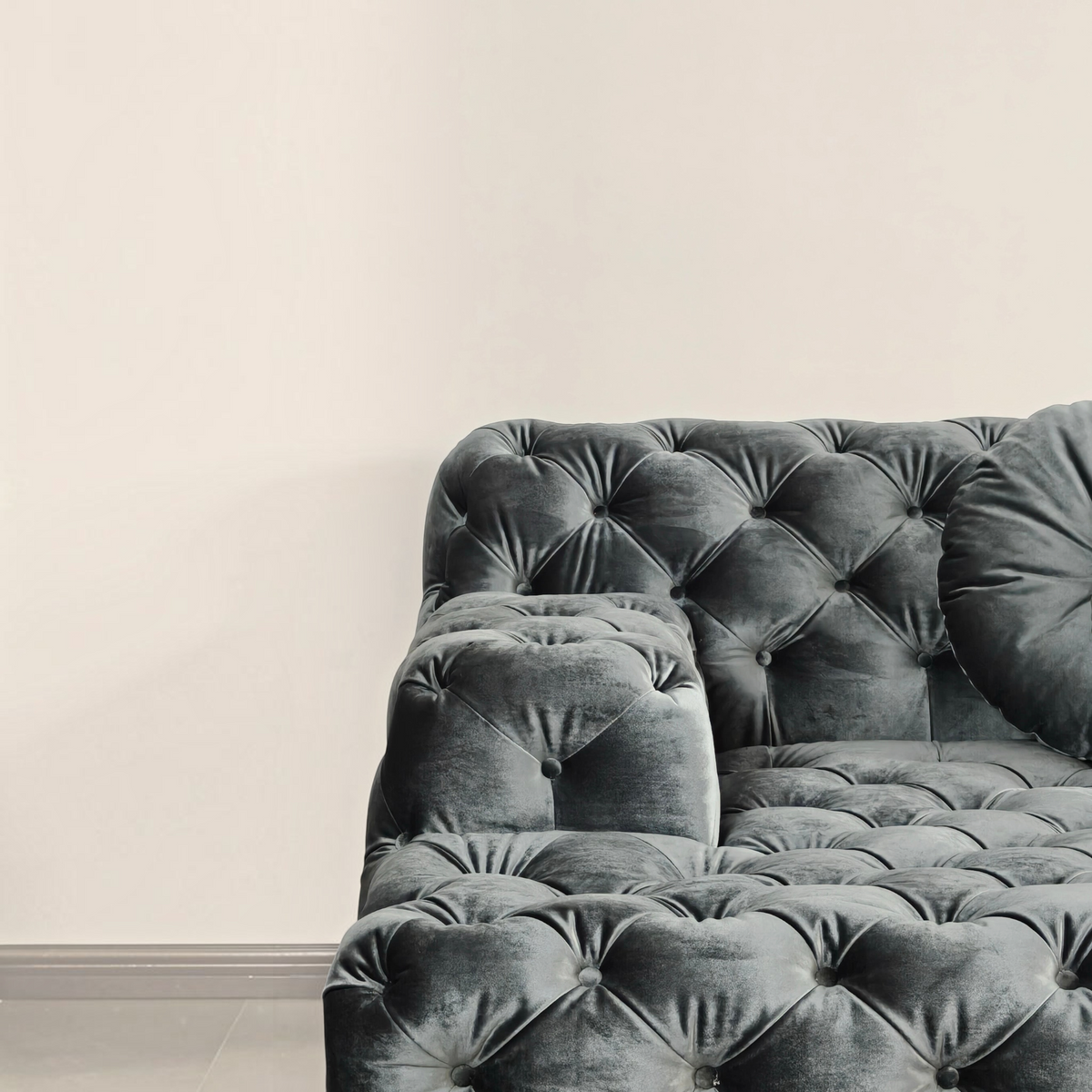 Urban Ashram Coco Miralda Chesterfield sofa in smoke grey velvet with deep button tufting and angled backrest.