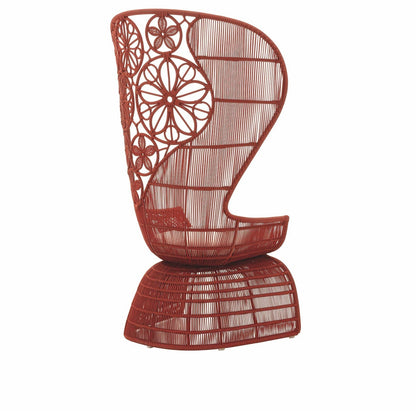 Urban Ashram Genevieve high-back armchair in terracotta with intricate floral woven backrest and hollow base